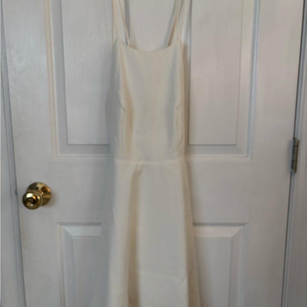 XS white Lulu’s dress, scallop hem, adjustable ties, open back, & zipper in back